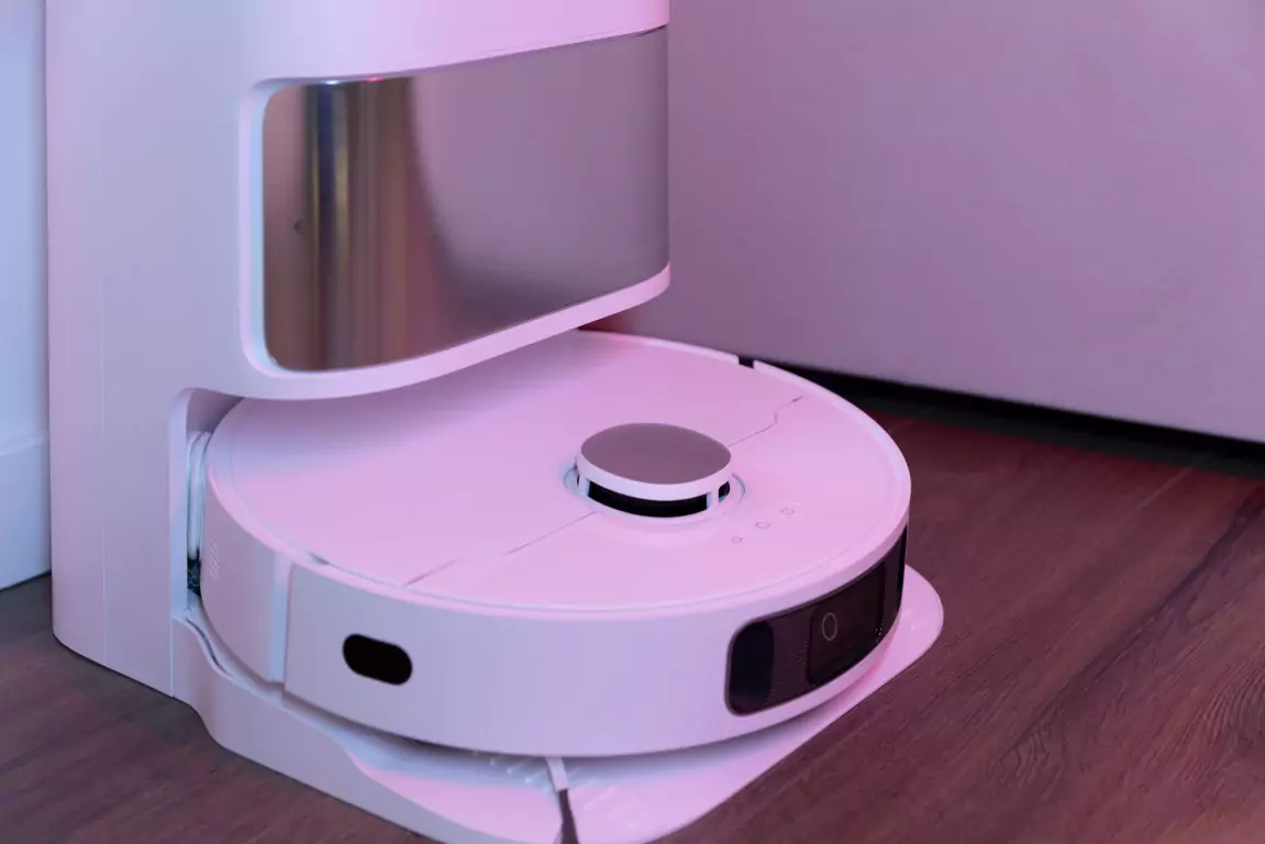 robot vacuum cleaner navigating around furniture